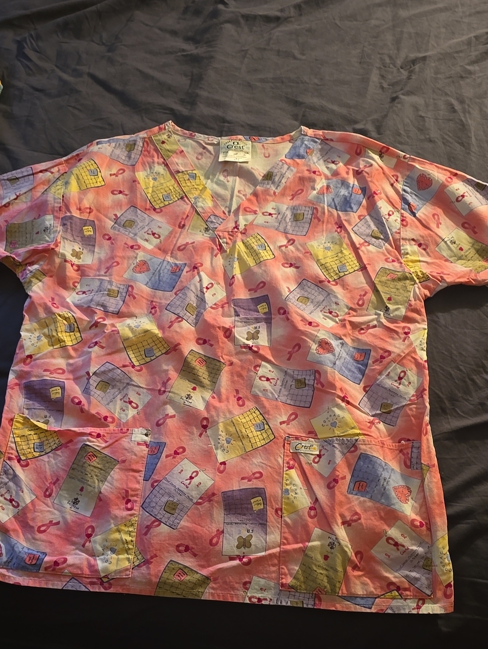 Pink Patterned Scrub Top with Breast Cancer Ribbon & Notebook Print